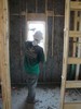 g. Workmen blowing the insulation (101) (384x512, 82.6 kilobytes)