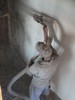 g. Workmen blowing the insulation (103) (384x512, 57.1 kilobytes)