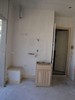 v. The garage gets its sink and cabinet (384x512, 46.7 kilobytes)